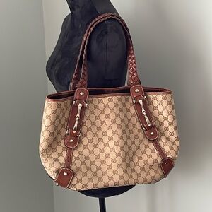 GUCCI PELHAM Tote with signature Horsebit fixtures & braided shoulder straps.